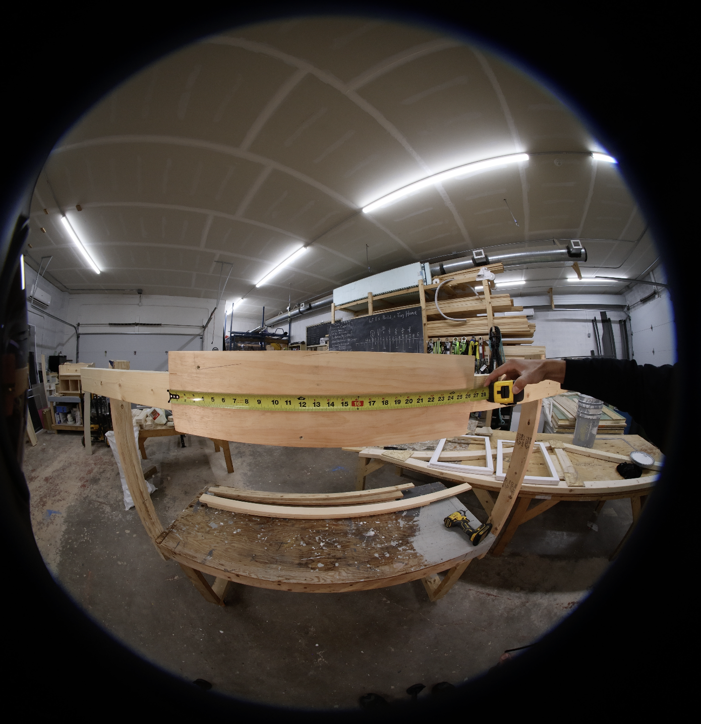 Raw 360-degree camera frame from a carpentry shoot