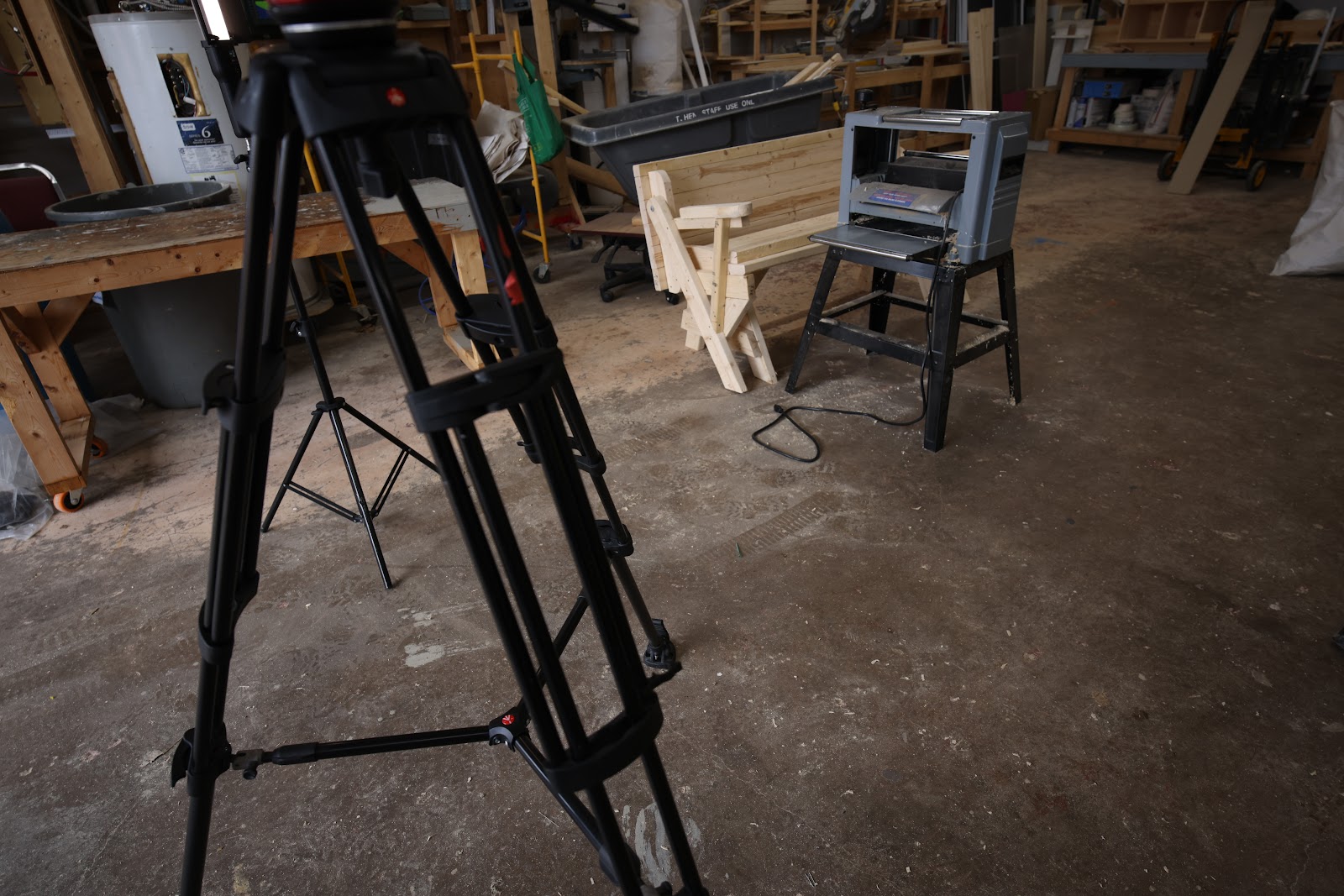 Carpentry instructor planning a course in his workshop